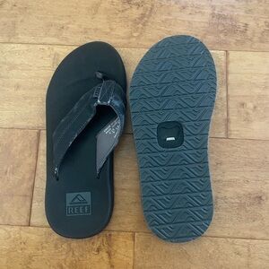 New Reef Black Flip Flops bottle opener